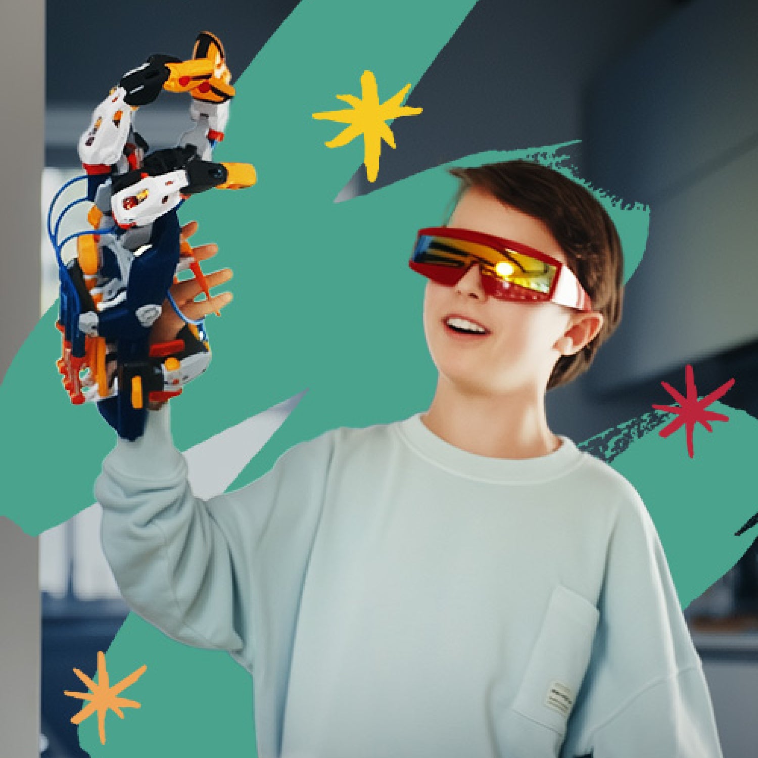 Junge mit Cyborg-Hand und Schutzbrille | Experimentierkasten